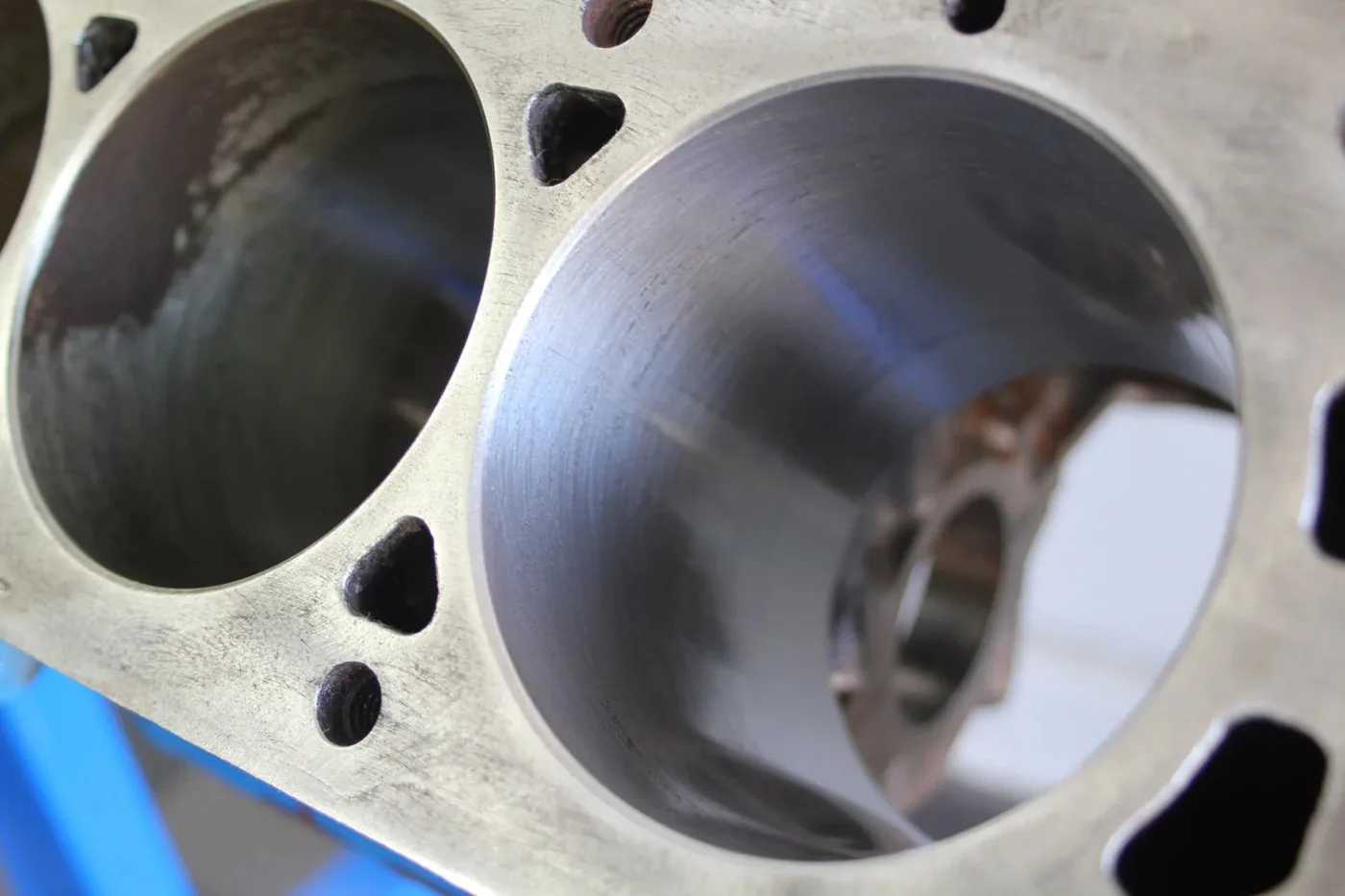 Close-up of cylinder bore interior showing smooth honed surface finish