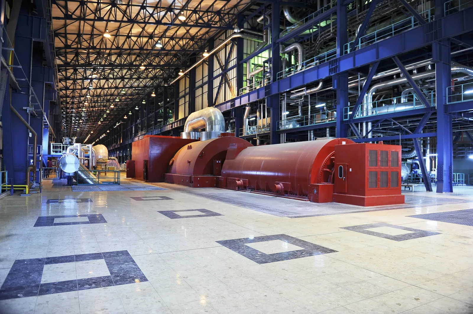 Power generation turbine hall — large rotating machinery requiring anti-vibration isolation