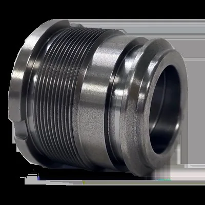 Precision machined steel gland nut with external threads — showing the scale of components handled