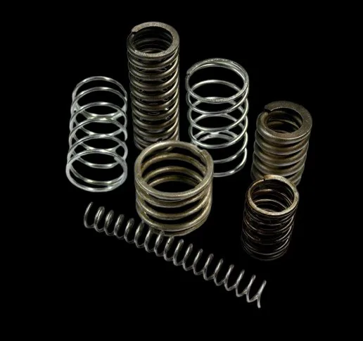 Assortment of industrial compression and coil springs in different sizes and materials